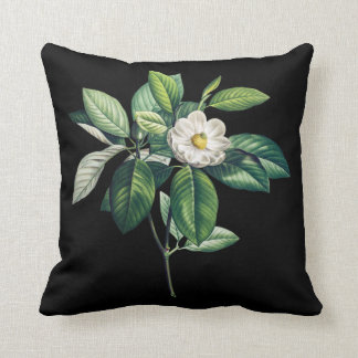 Coussin noir avec la magnolia blanche