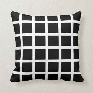 Coussin noir et blanc de motif de grille