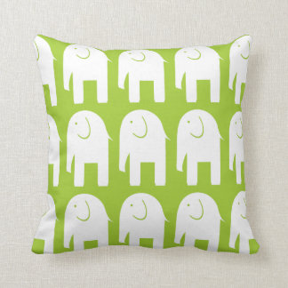 Coussin Objets superflus sur le vert