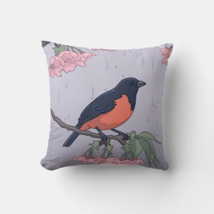 Coussin Oiseau noir et rouge charmant sur une branche de c