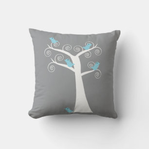 Coussin Oiseaux bleus sur arbre blanc fond gris nature