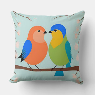 Coussin Oiseaux de dessin animé colorés perchés sur une br