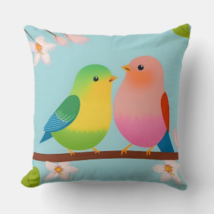 Coussin Oiseaux de dessin animé colorés perchés sur une br