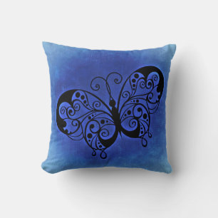 Coussin Papillon fantaisie sur un arrière - plan Denim ble