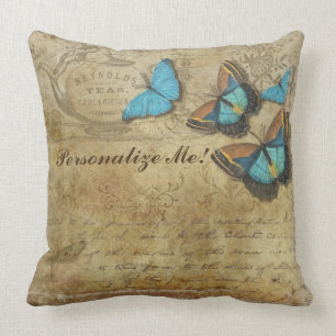 Coussin Papillons bleus sur le papier vintage de thé