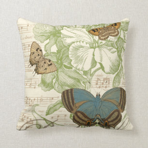 Coussin Papillons sur la musique de feuille avec la