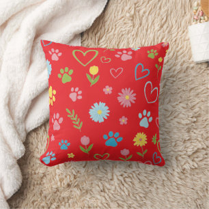 Coussin pastel empreinte de patte et coeurs