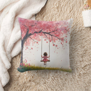 Coussin Petite fille sur une aile de cerisier