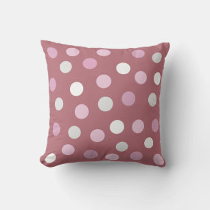 Coussin Points polka sur fond or rose