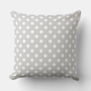 Coussin Pois blancs classiques sur un arrière - plan gris 