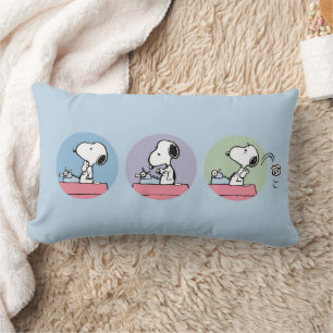 Coussin Rectangle cacahuètes Snoopy à la machine à écrire