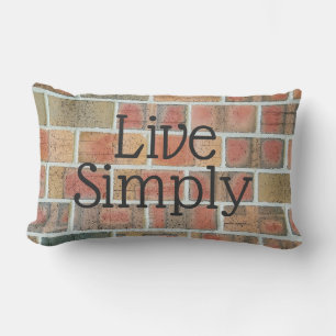 Coussin Rectangle citation inspirante sur brique