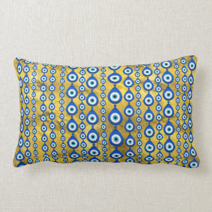 Coussin Rectangle motif de l'oeil malin sur la texture dorée