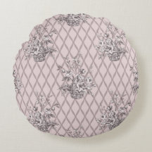 Coussin rond vintage floral en rose poussiéreux