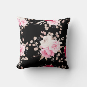 Coussin rose, blanc floral noir sol