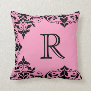 Coussin rose et noir de damassé de monogramme