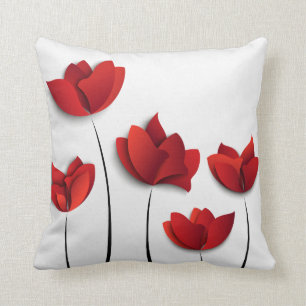 Coussin rouge de conception florale