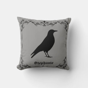 Coussin Silhouette de corbeau et volutes décoratives grise