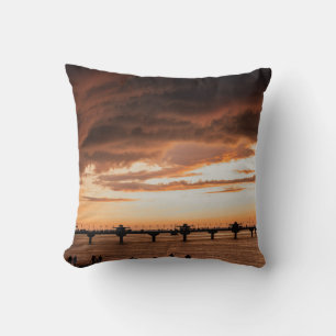 COUSSIN SILHOUETTE DE PERSONNES SUR LA PLAGE PENDANT LE CO
