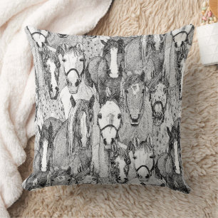 Coussin simplement des chevaux noirs blancs
