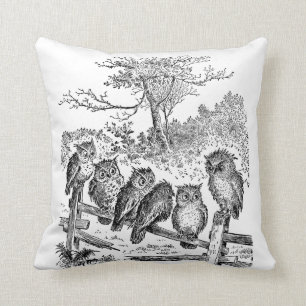 Coussin Six petits hiboux se reposant sur une barrière