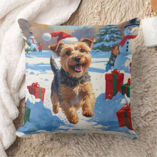 Coussin Skye Terrier courant dans la neige avec un chapeau
