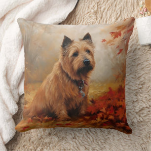 Coussin Terrier Australien dans les feuilles d'automne qui
