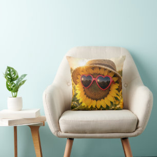 Coussin Tournesol portant des lunettes de soleil et un cha