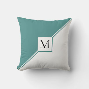 Coussin Triangles turquoises et monogramme moderne