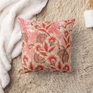 Coussin Un design coloré en rouge et pêche, avec