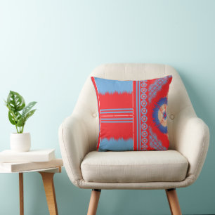 Coussin un design d'un motif rouge et bleu