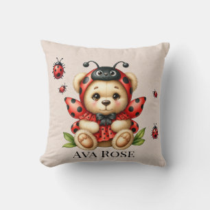 Coussin Un mignon ours en peluche habillé comme une coccin