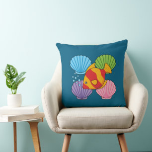 Coussin Un poisson tropical orange et des coquillages past