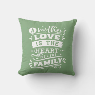 Coussin Une Mère d'amour vert doux à la main