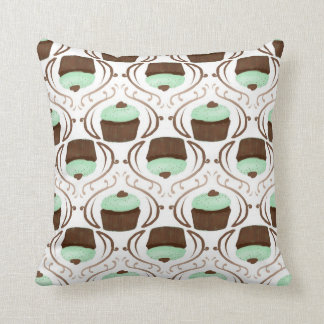 Coussin vert en bon état de petit gâteau de