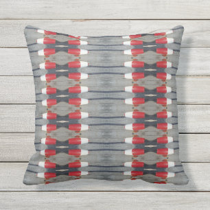 Coussin Vieux rouge blanc bobard sur quai bleu lac retour