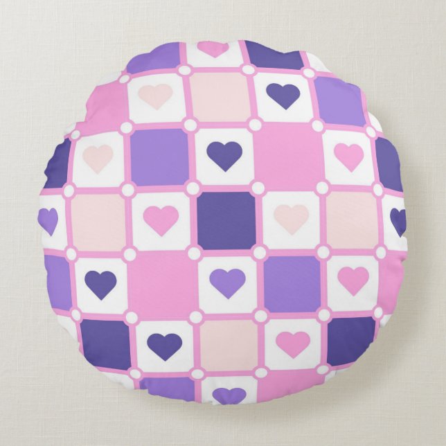 COUSSINS RONDS COEURS ROSE ET PURPLE ET MOTIFS PLAIDÉS (Devant)