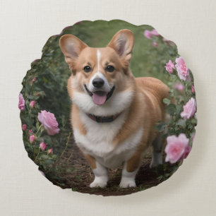 Coussins Ronds "Compagnie de charme : Un Corgi dans un jardin ros