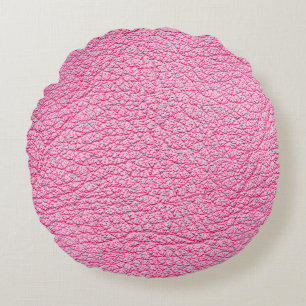 Coussins Ronds Cuir rose gros plan, arrière - plan texturé.