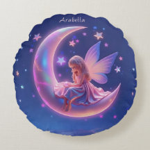 Jolie fée blonde lumineuse assise sur la lune
