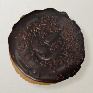 Coussins Ronds Le beignet de chocolat avec du chocolat arrose le