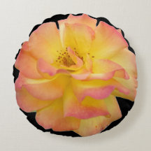 Oreiller rond à fleurs roses jaunes et roses