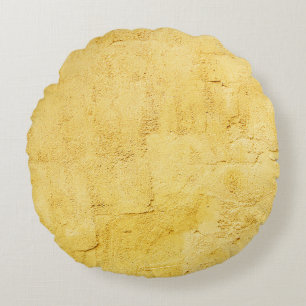 Coussins Ronds plâtre abstrait jaune clair sur le mur