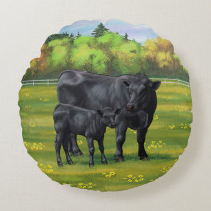 Coussins Ronds Vache d'Angus noir et veau mou en pâturage d'été
