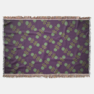 Couverture à franges avec fleur sur pourpre