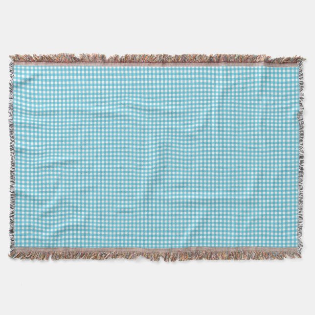 Couverture A light blue and white checkered blanket  (Devant)