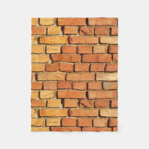couverture en laine polaire mur de pierre