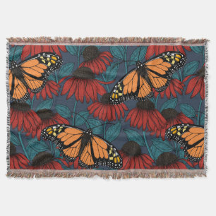 Couverture Papillon monarque sur des fleurs rouges