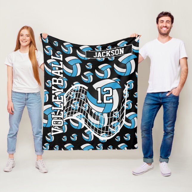 Couverture Polaire Bébé Motif de volley-ball bleu, noir et blanc (En situation)
