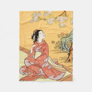 Couverture Polaire Femme assise sous les fleurs de cerisier